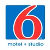 A blue square logo with a large red number 6 in the center and the words motel + studio in lowercase blue letters below it.