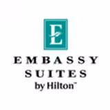 Embassy Suites by Hilton logo featuring a green square with a white letter E above the words Embassy Suites by Hilton in black text on a white background.